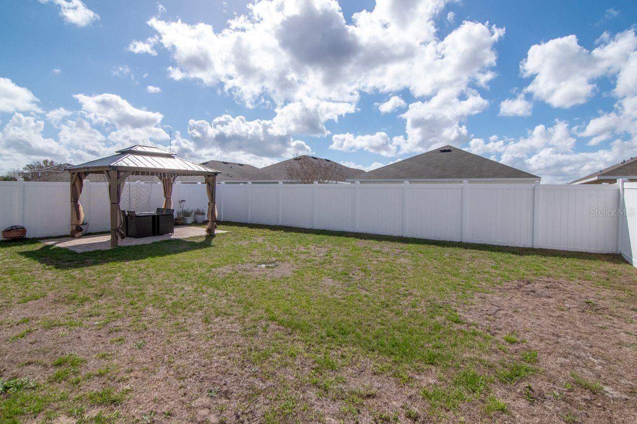 Large Backyard with customer pool and gazebo for entertaining