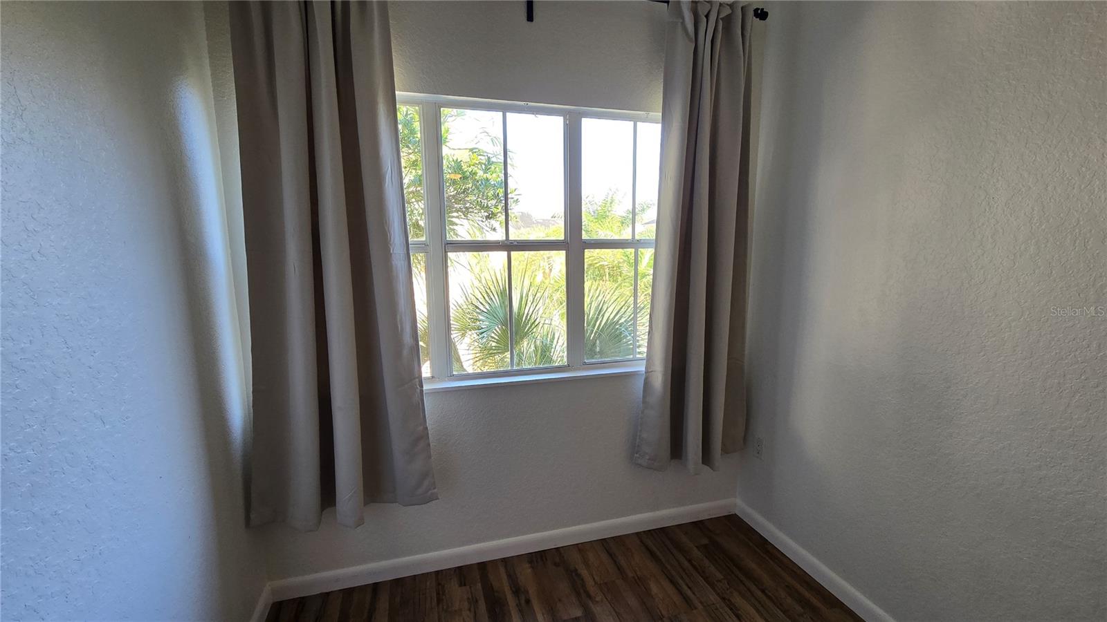 view of courtyard and pool from unit