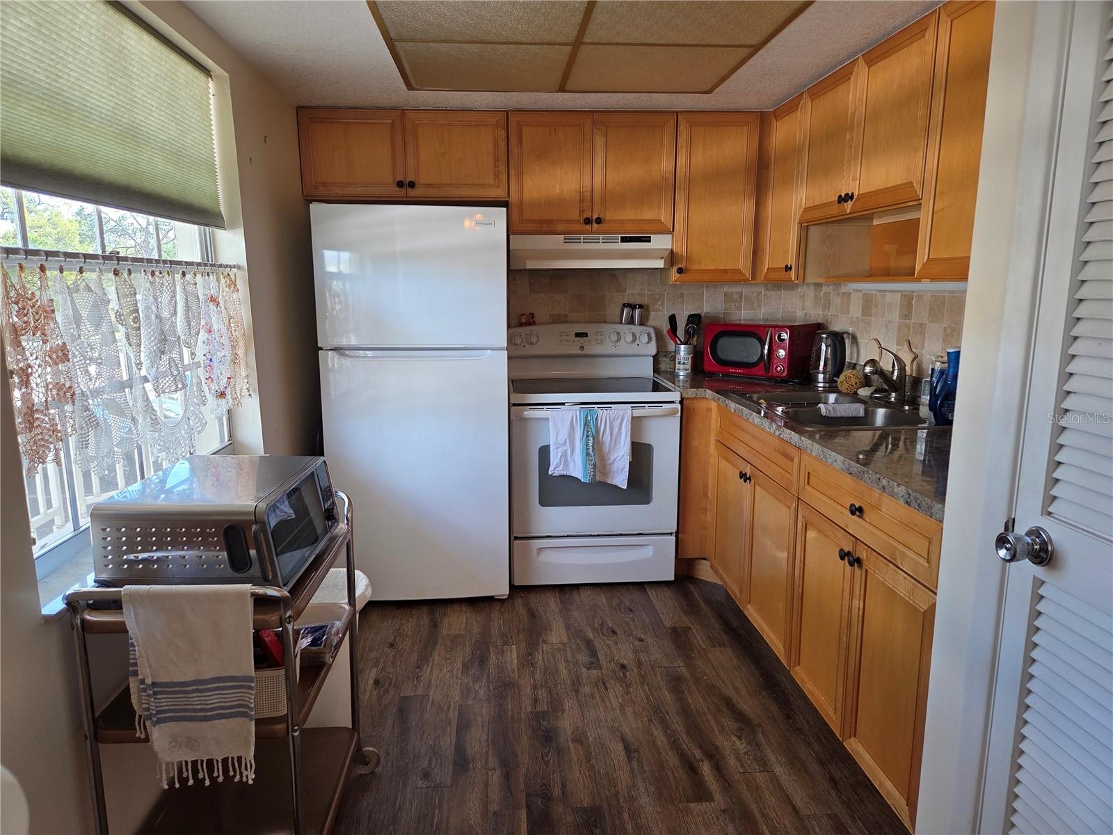 Newer kitchen cabinets.