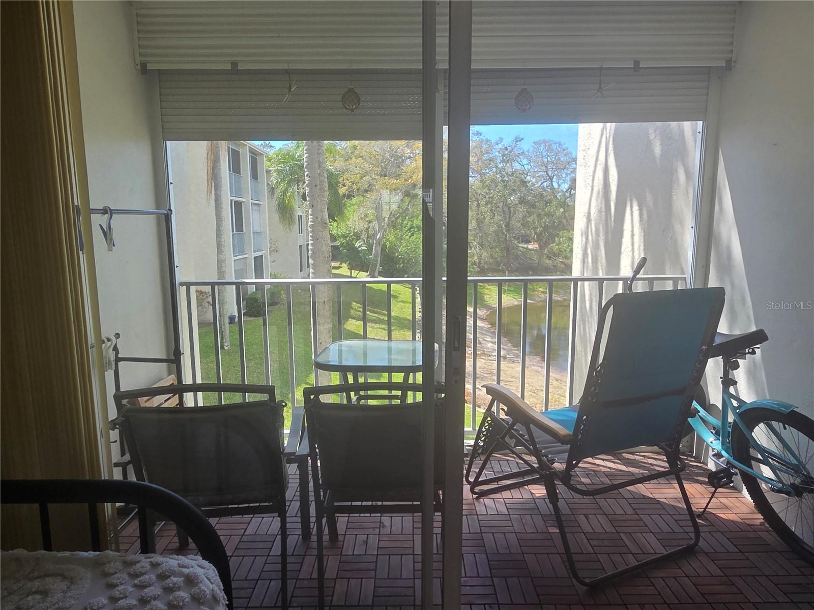 Sunny screened in balcony