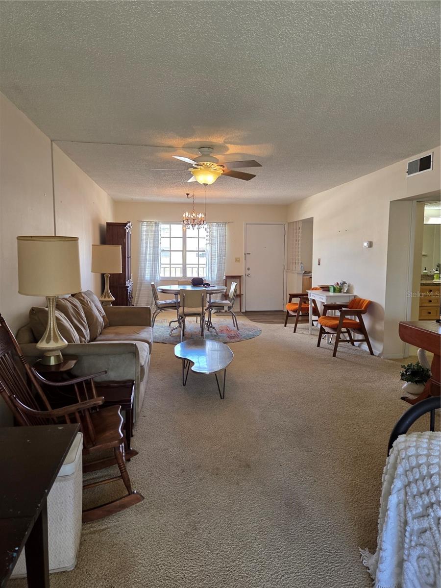 Looking into the dining room from your sunny balcony