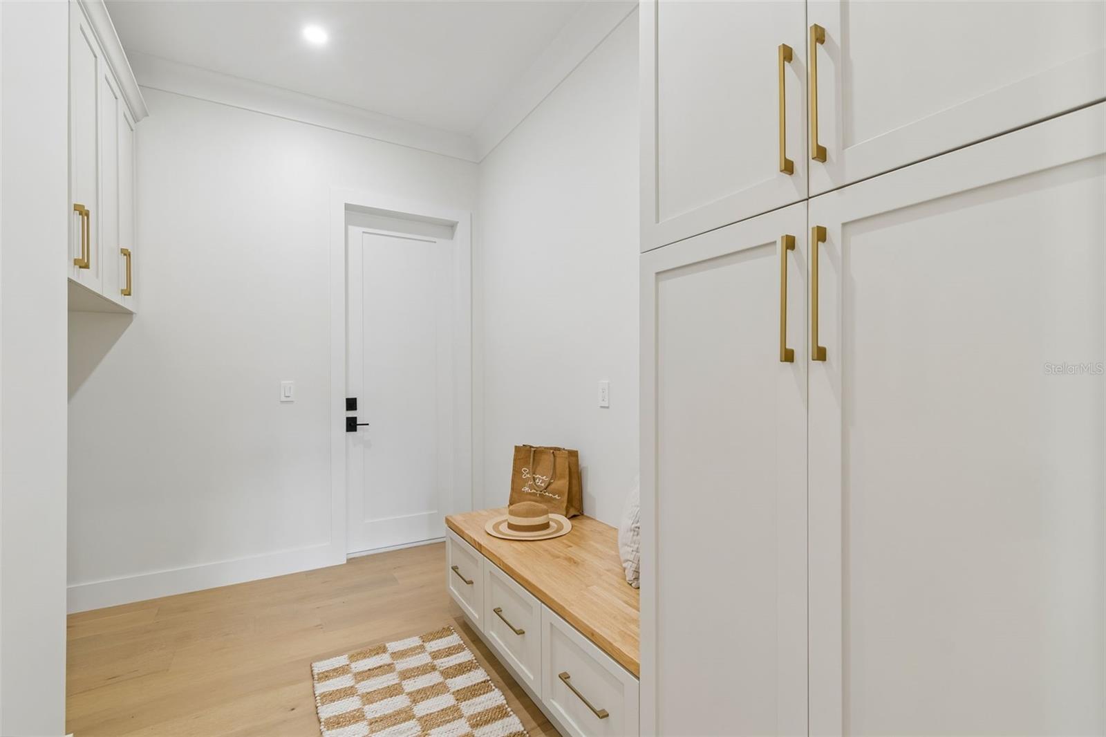 Mudroom with laundry hookup