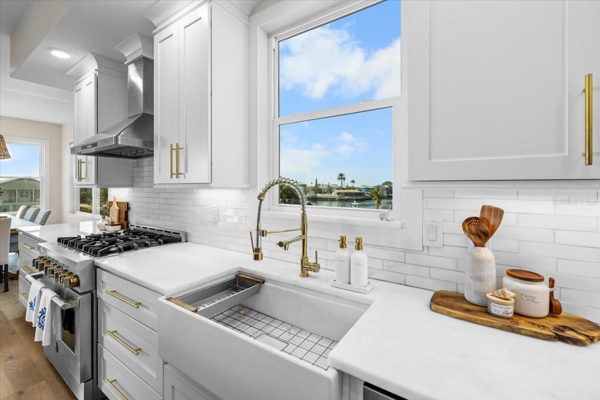 single deep country sink with custom faucet