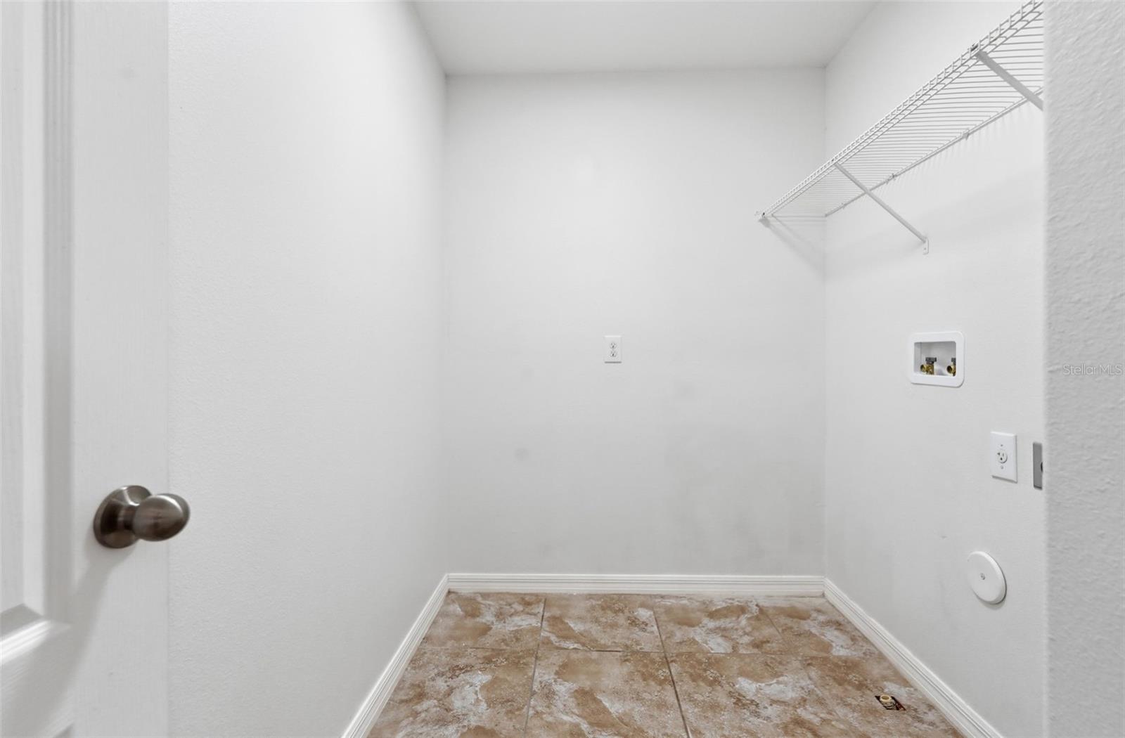 laundry room upstairs close to 4 of the bedrooms