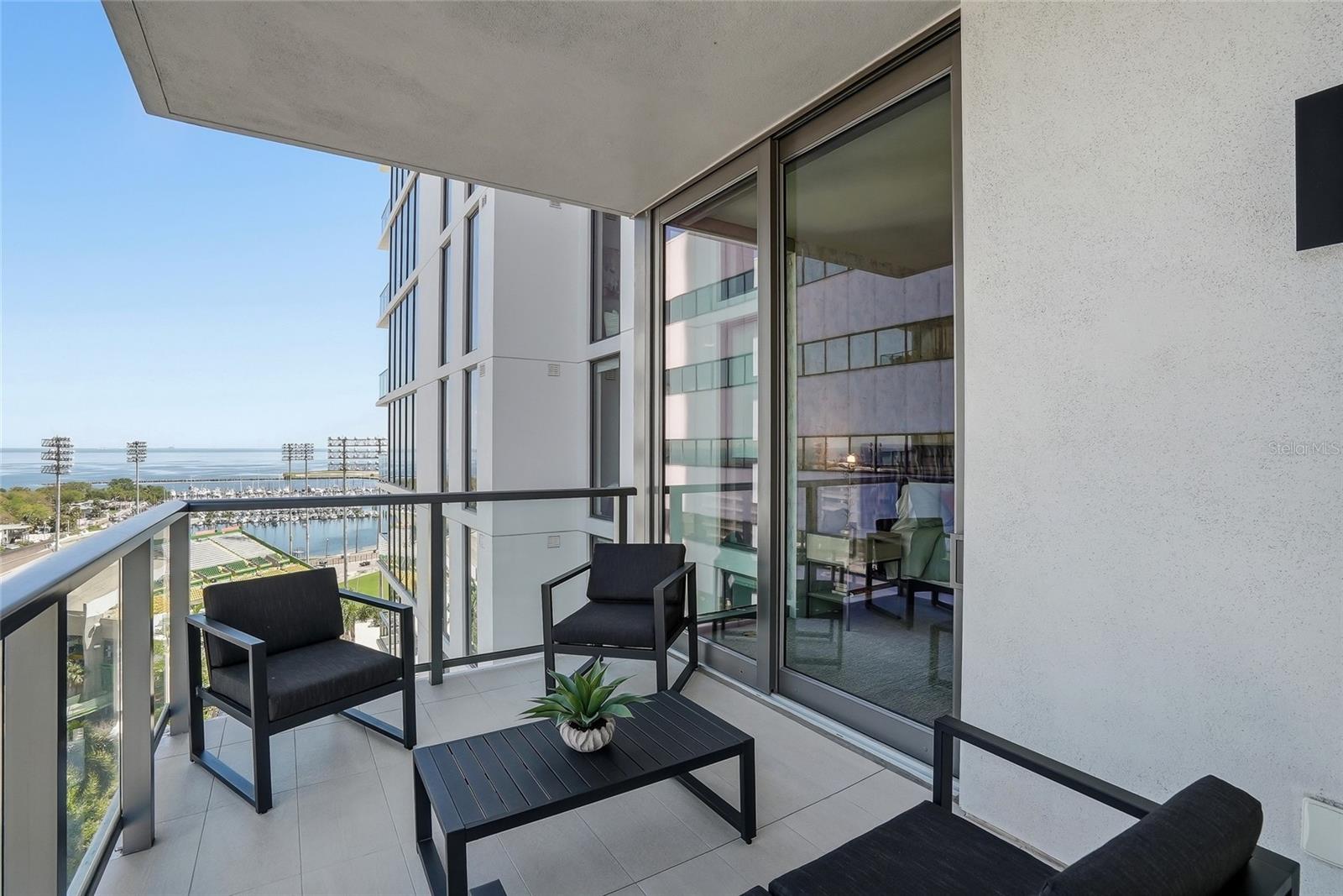 Two private terraces offering beautiful downtown and water views, perfect for enjoying sunrise morning coffee or sunsets and evening city lights.