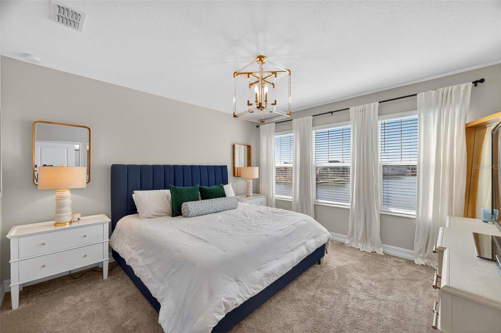 Third level- Primary suite- endless water views through impact rated windows