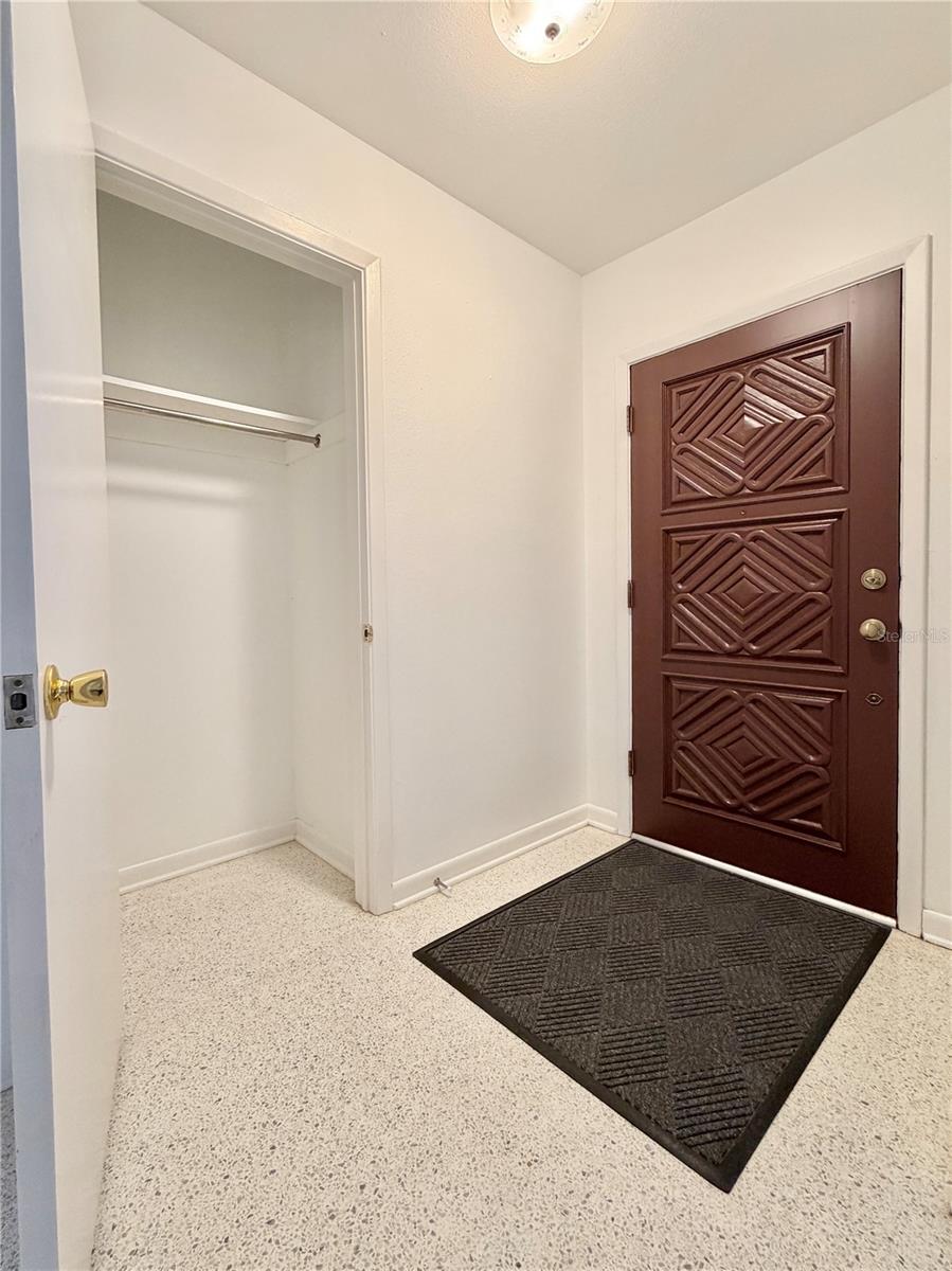 Coat closet just inside.