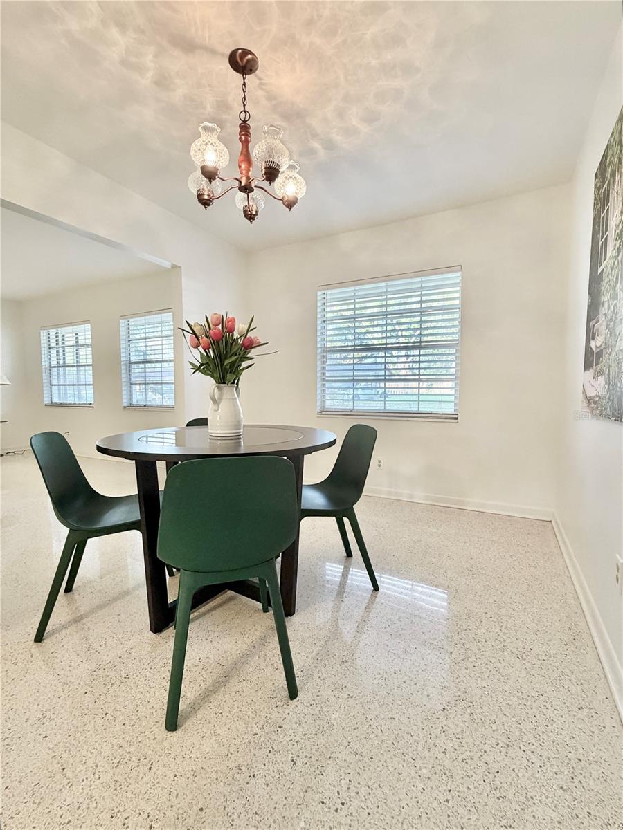Dining room with terrazzo floors.