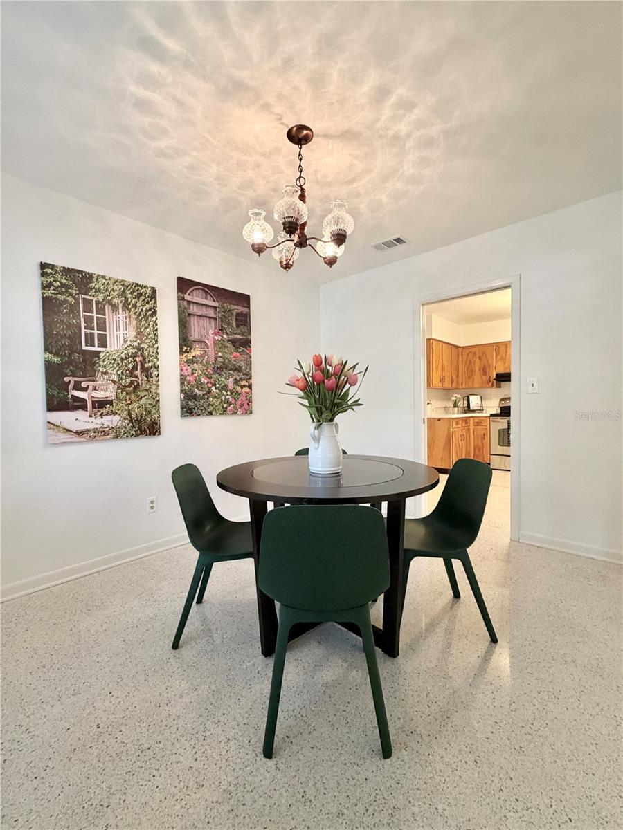 Dining room with terrazzo floors.