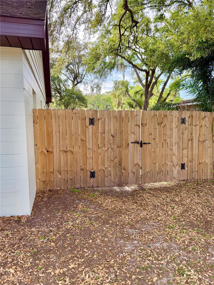 There is a gate on each side of the home.