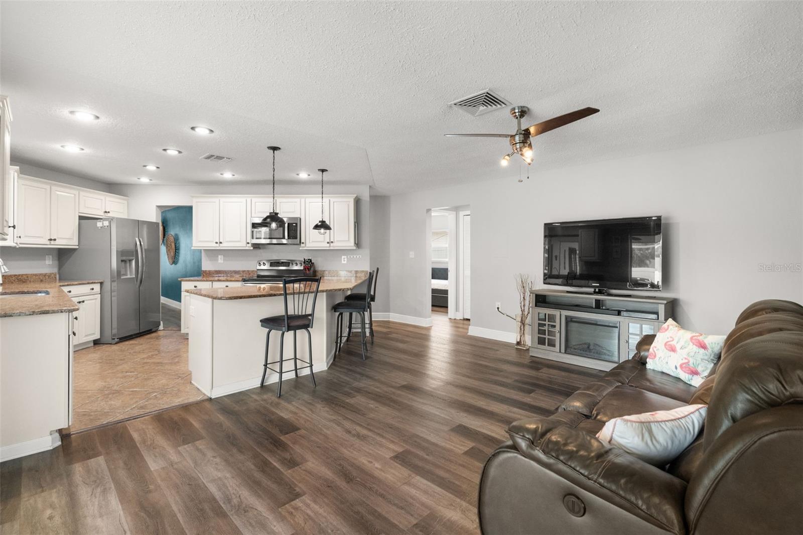 Family Room off Kitchen leading to Pool