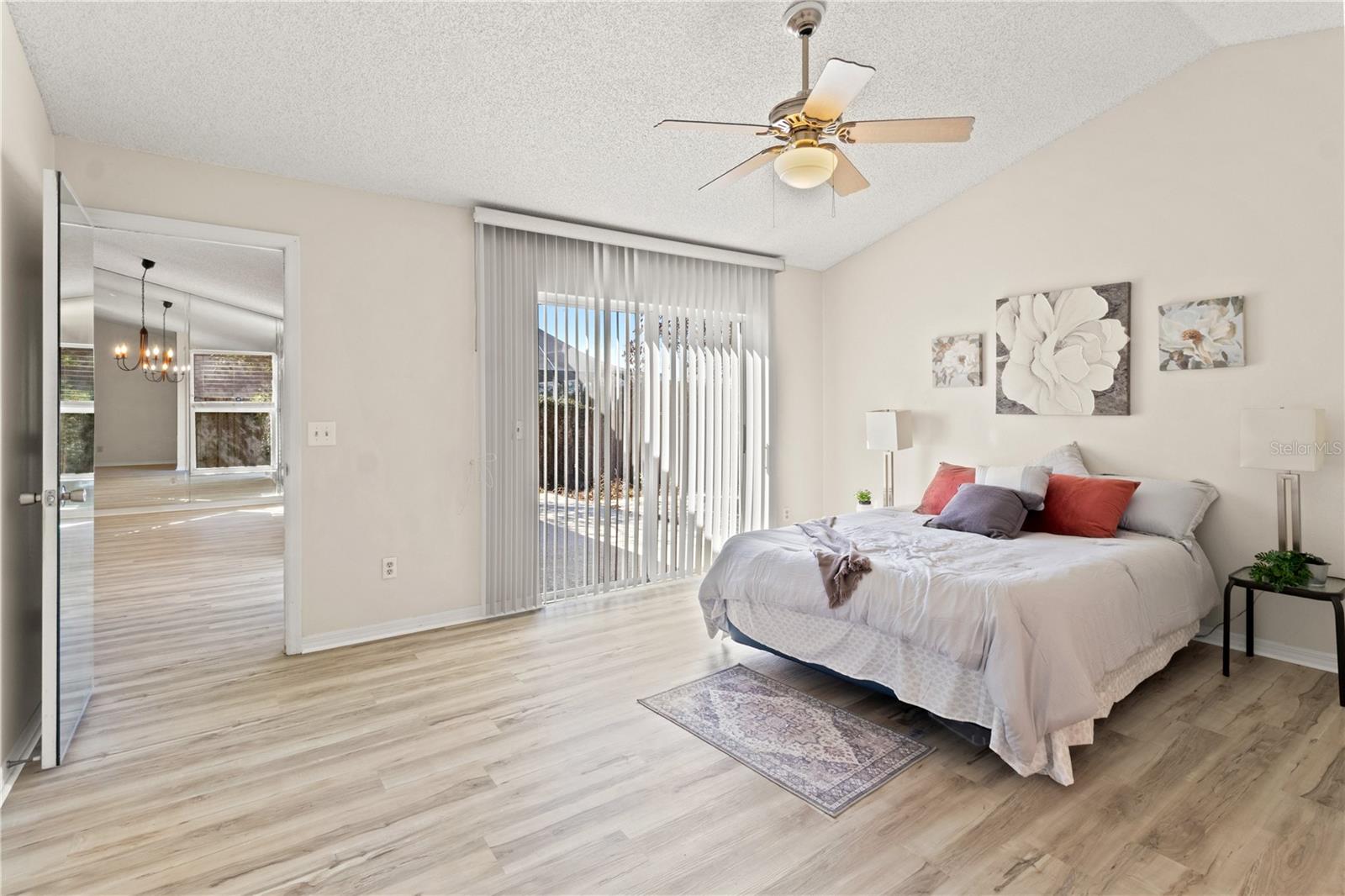 Primary bedroom. with LVP and high ceilings