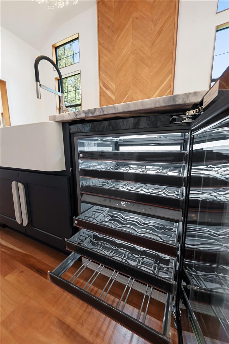 Farmhouse apron front sink, and GE Café wine refrigerator