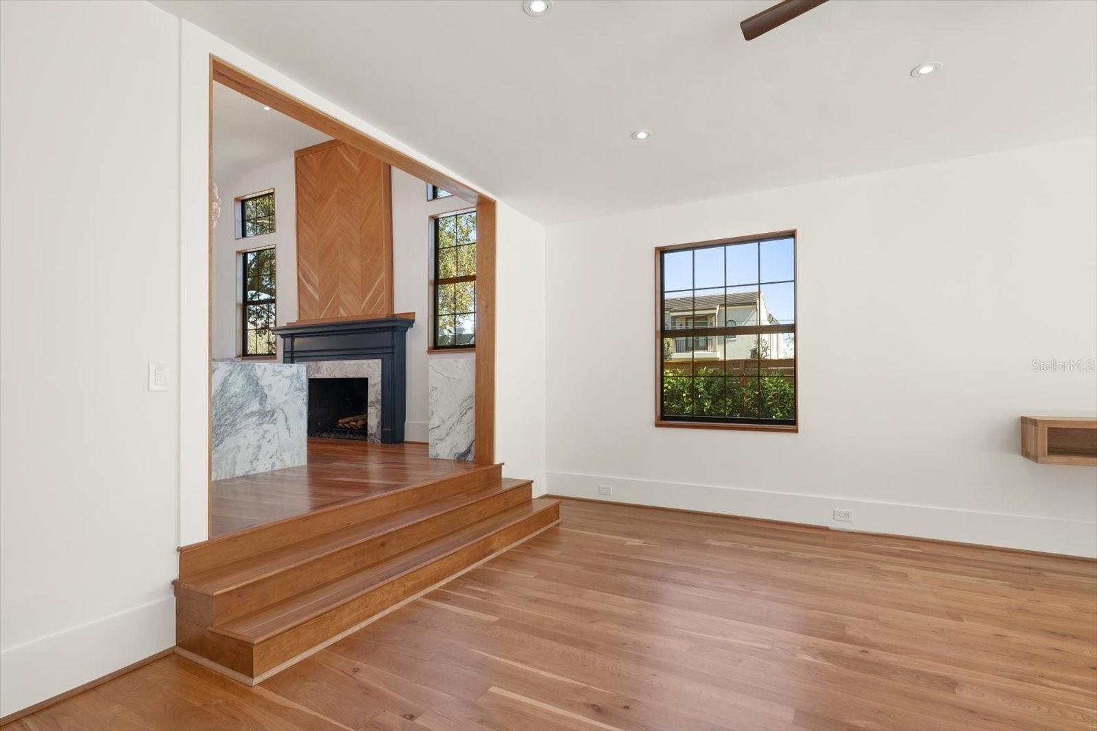 Step down from the kitchen to the Great Room