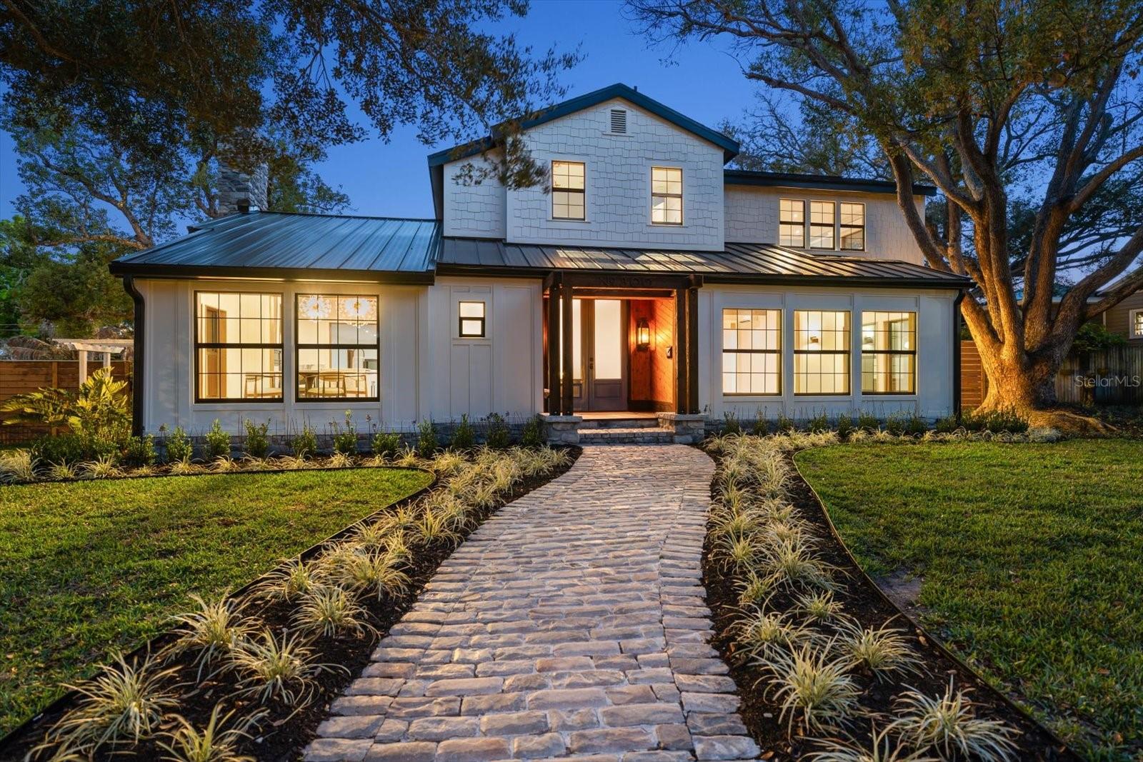 Front of home & walkway at twilight
