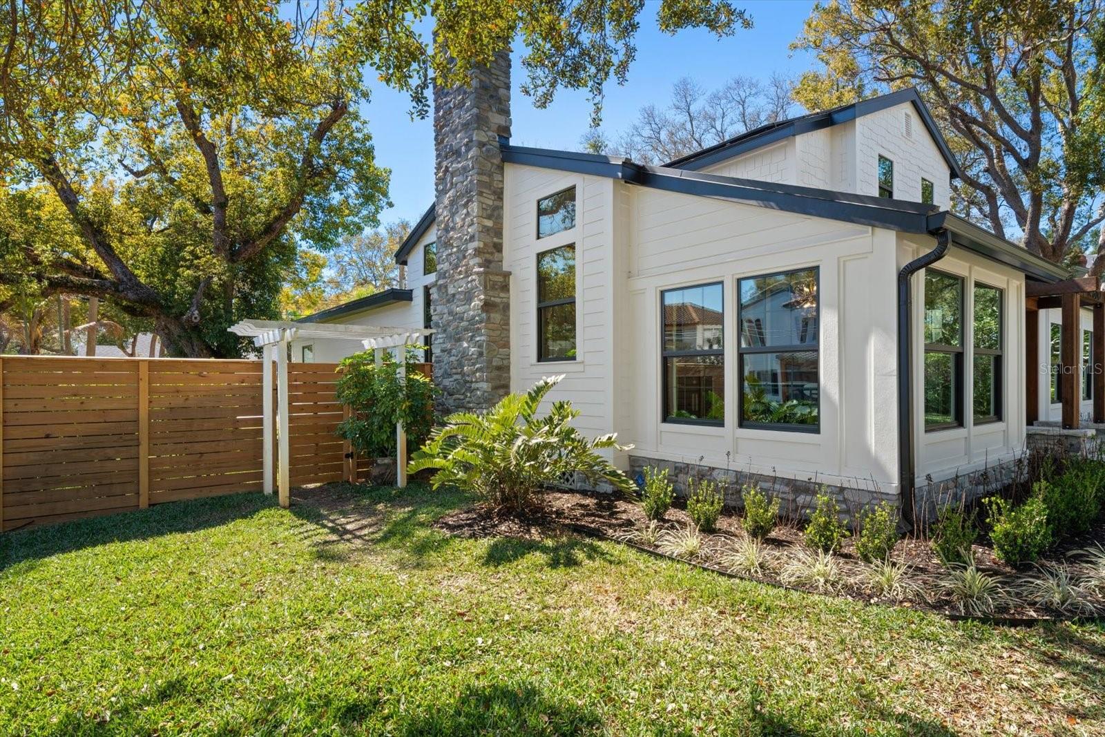 East side of home with gate to backyard