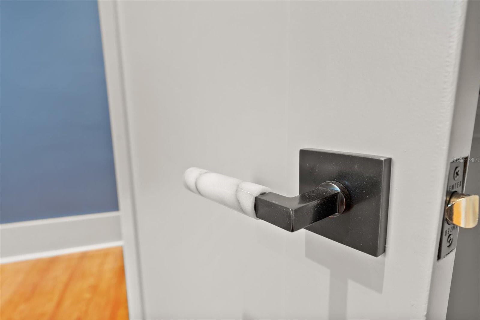 Emtek custom marble door handles throughout