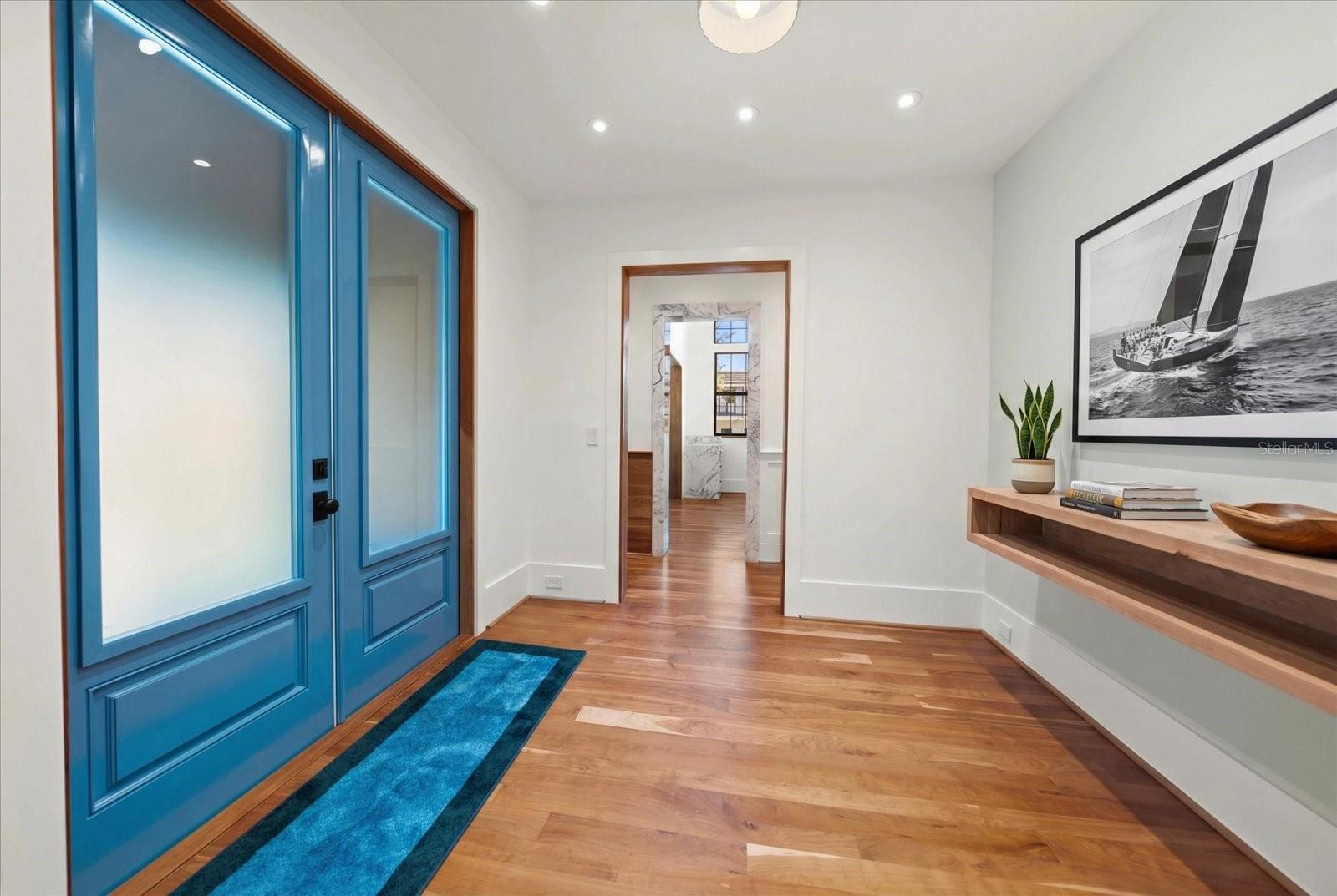 Foyer with floating shelves