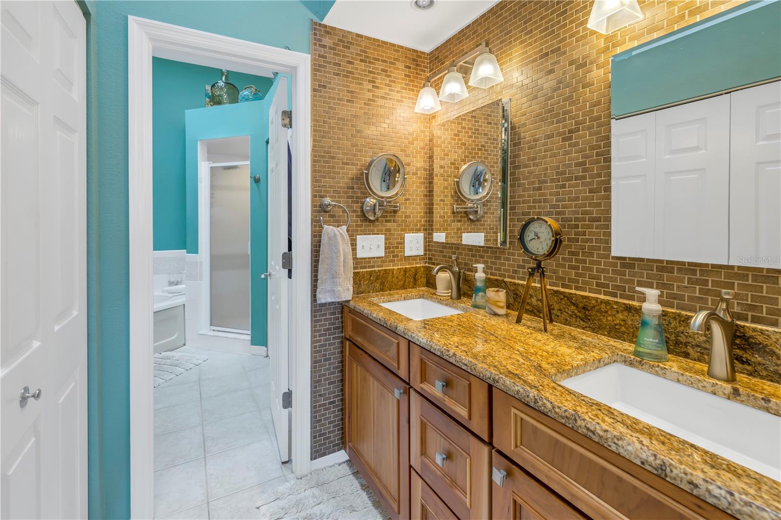 ensuite bath with dual sinks, shower and garden tub