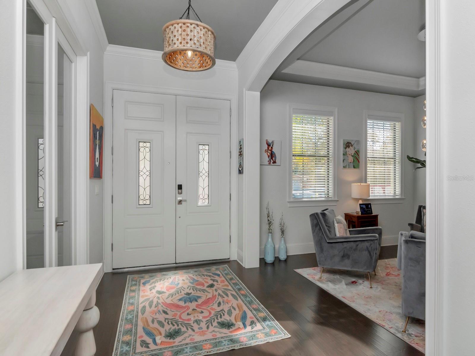 Front Entry with Home Office on the left and Living room or Dining room on the left