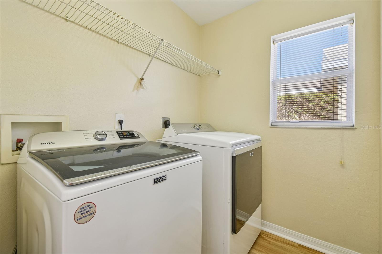 No trips to the garage or outside… this inside laundry room adds everyday convenience right where you need it.