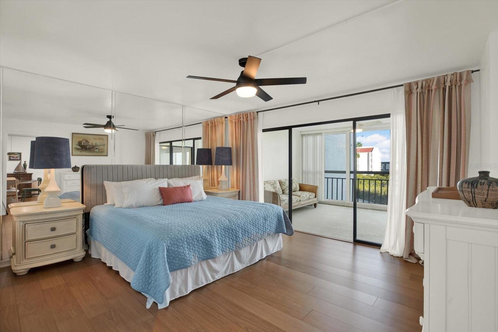 Primary Suite with bonus room and view of water