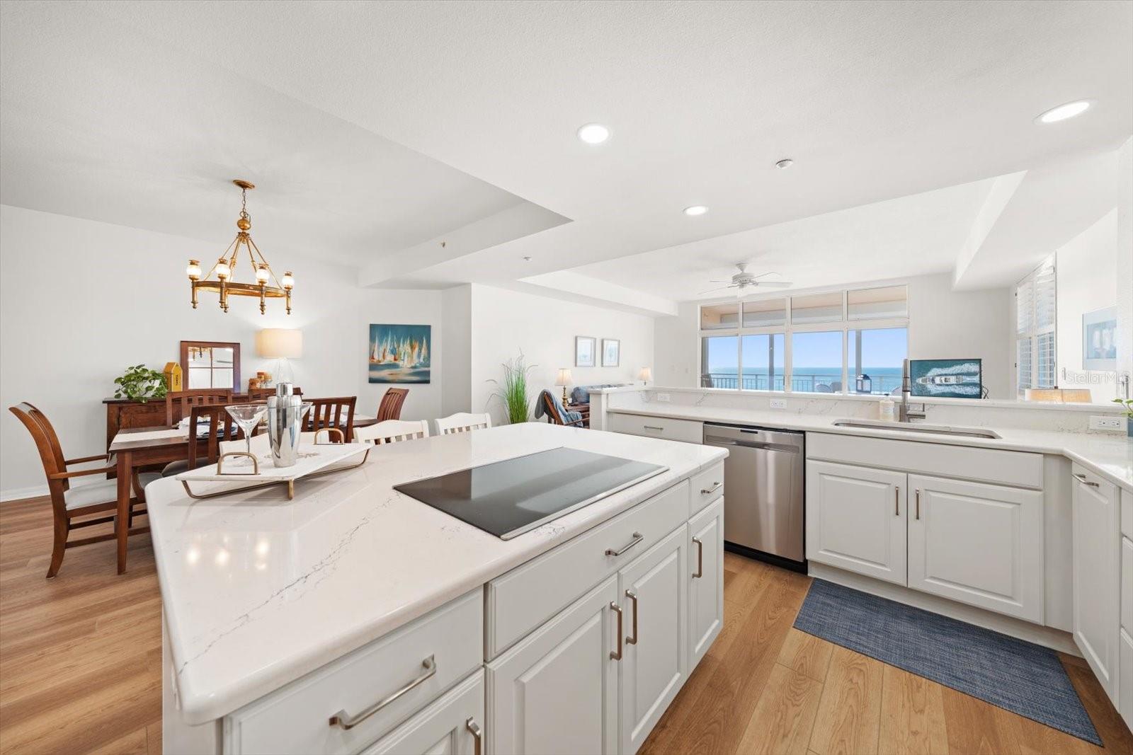 Chef's delight!! Sun-filled kitchen designed with a crisp, white -on-white aesthetic reflecting a timeless yet modern aura.