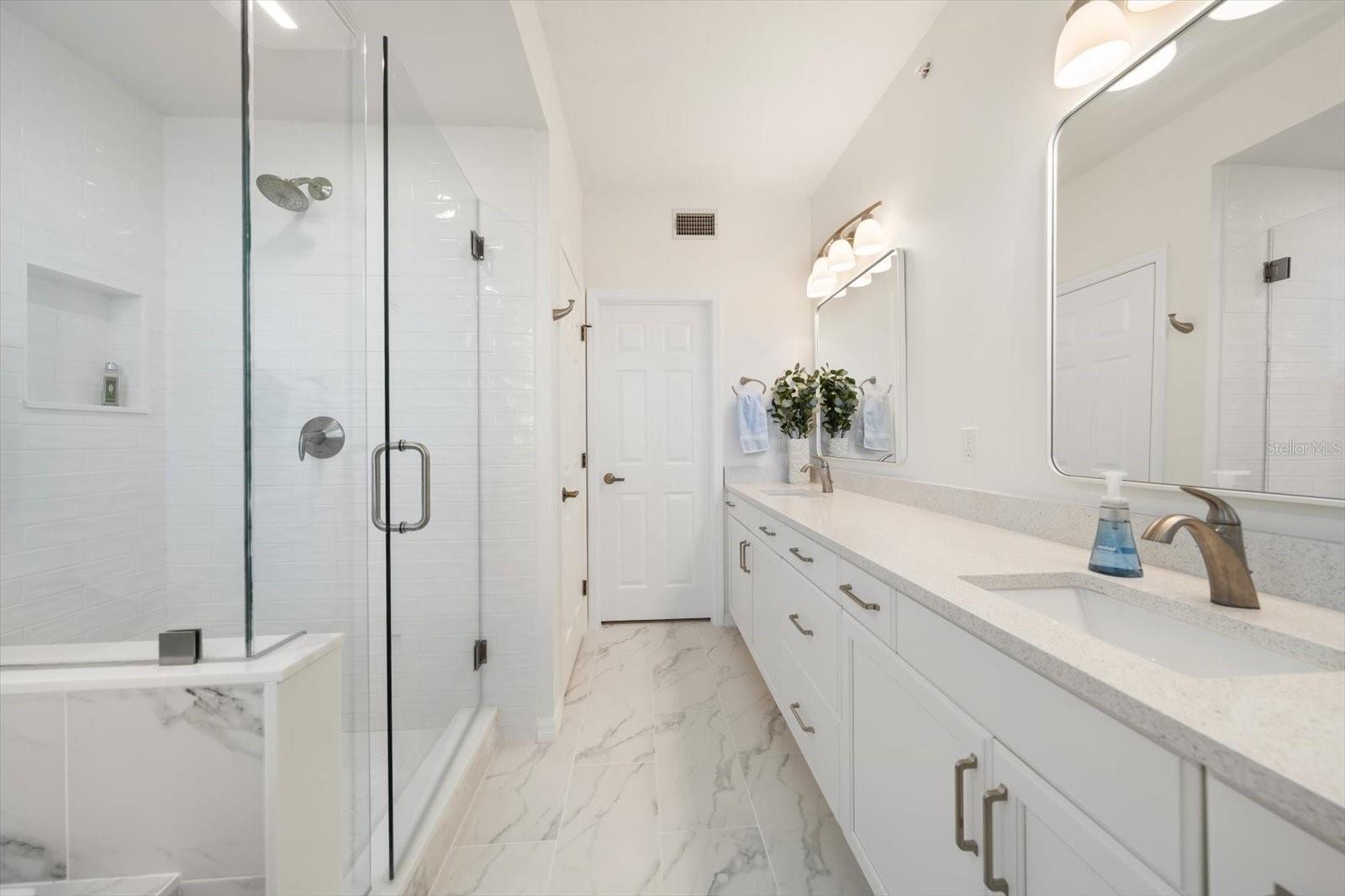 Spacious bath area - impeccably clean with contemporary lines.