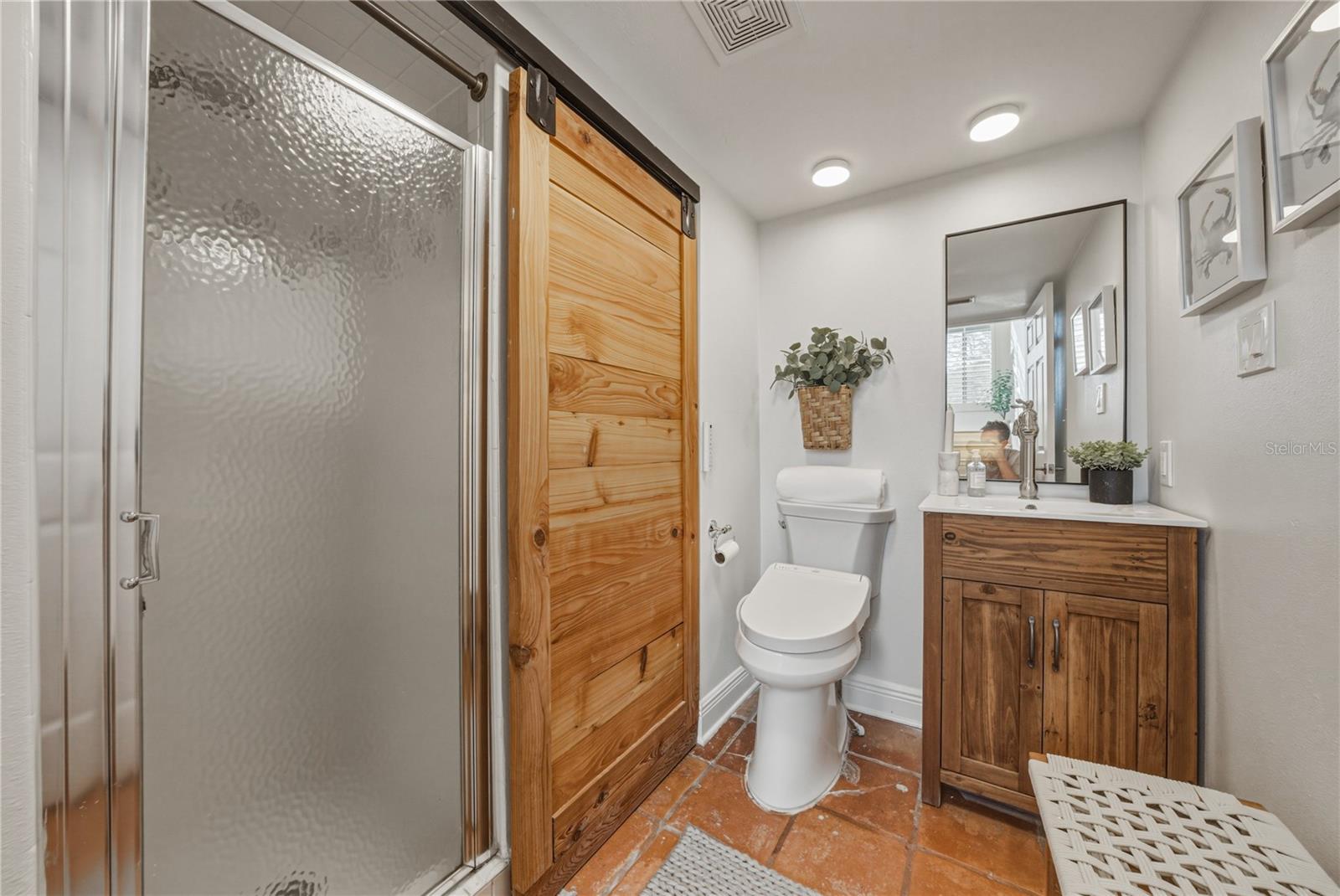 Second Full Bath with Shower and Linen Storage