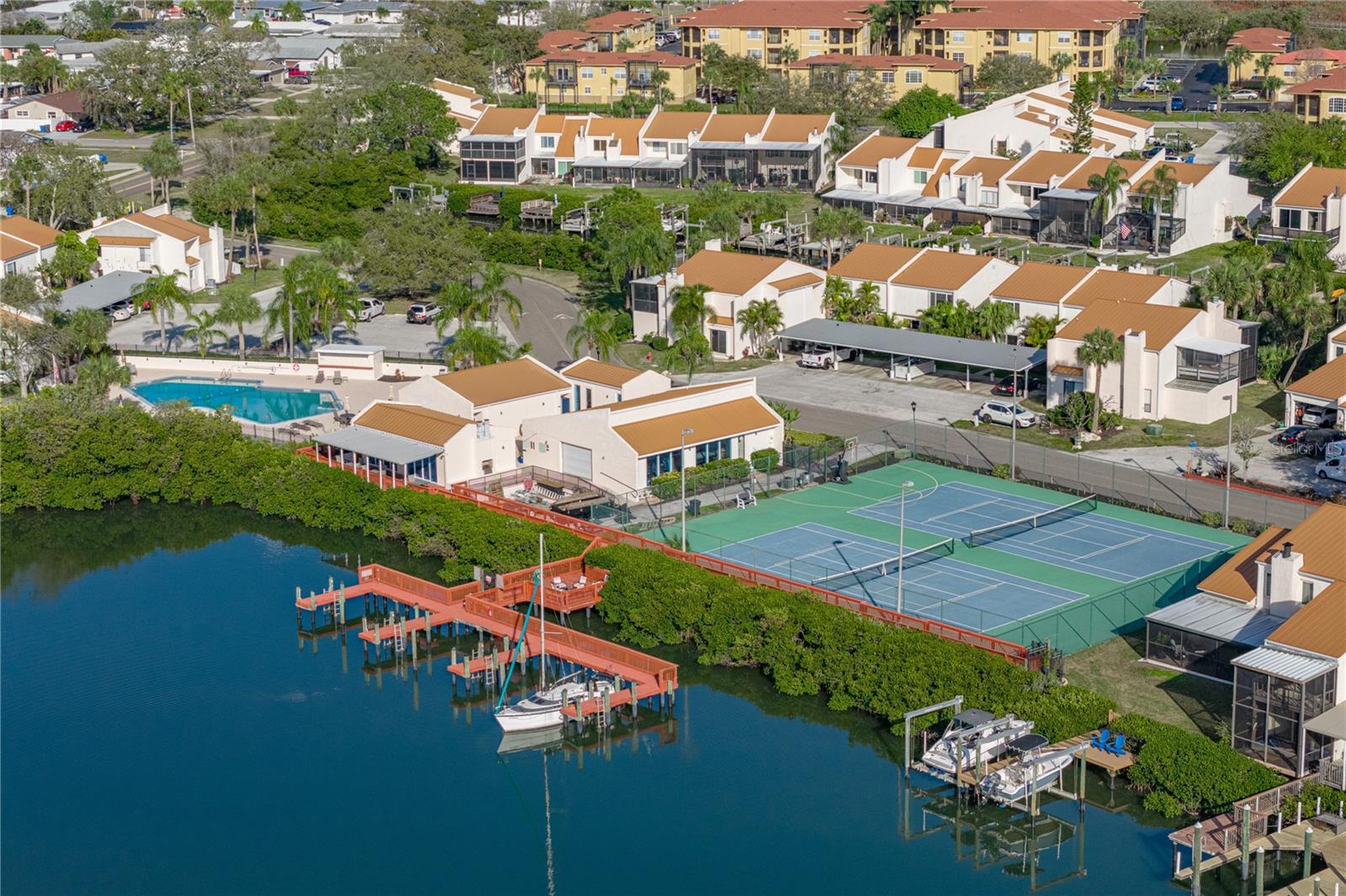 Community Clubhouse, Tennis Courts, Extra Boat Slips and Docks