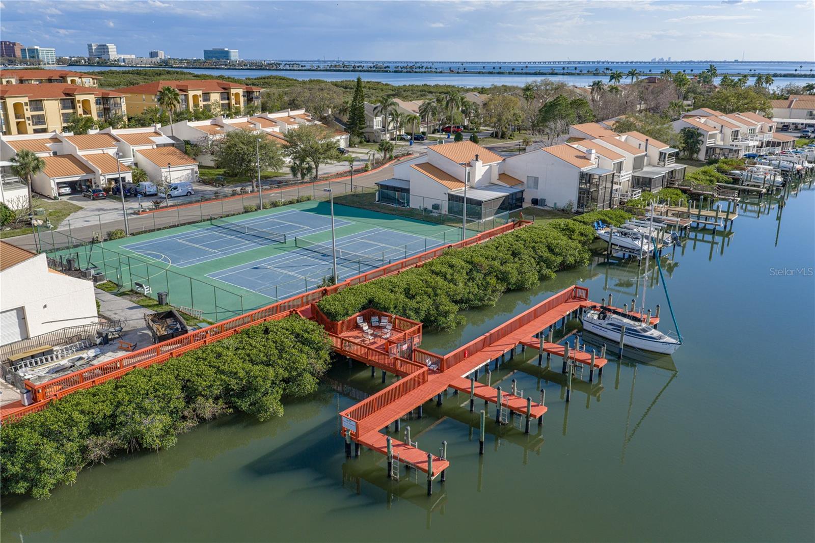 Community Clubhouse, Tennis Courts, Extra Boat Slips and Docks