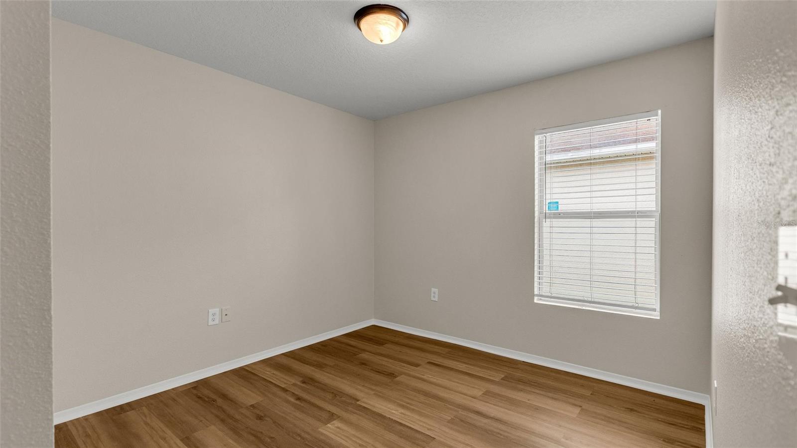 Bedroom 3 located just off the foyer.