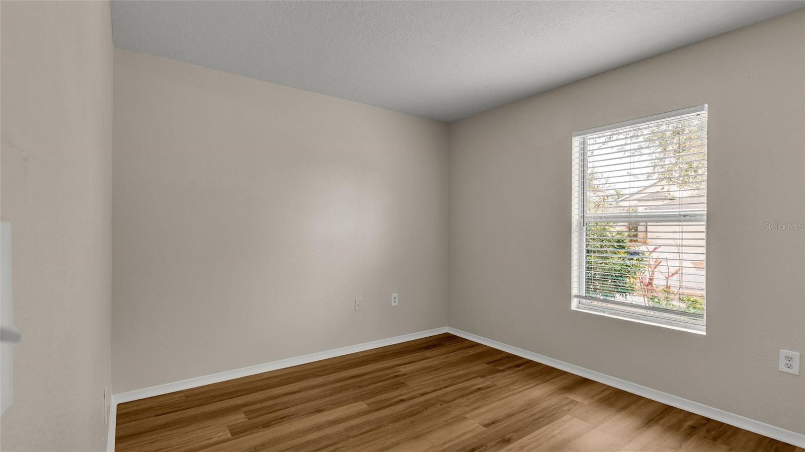 Bedroom 2 is located just off the foyer on the front of the home.  This would make a great office too!