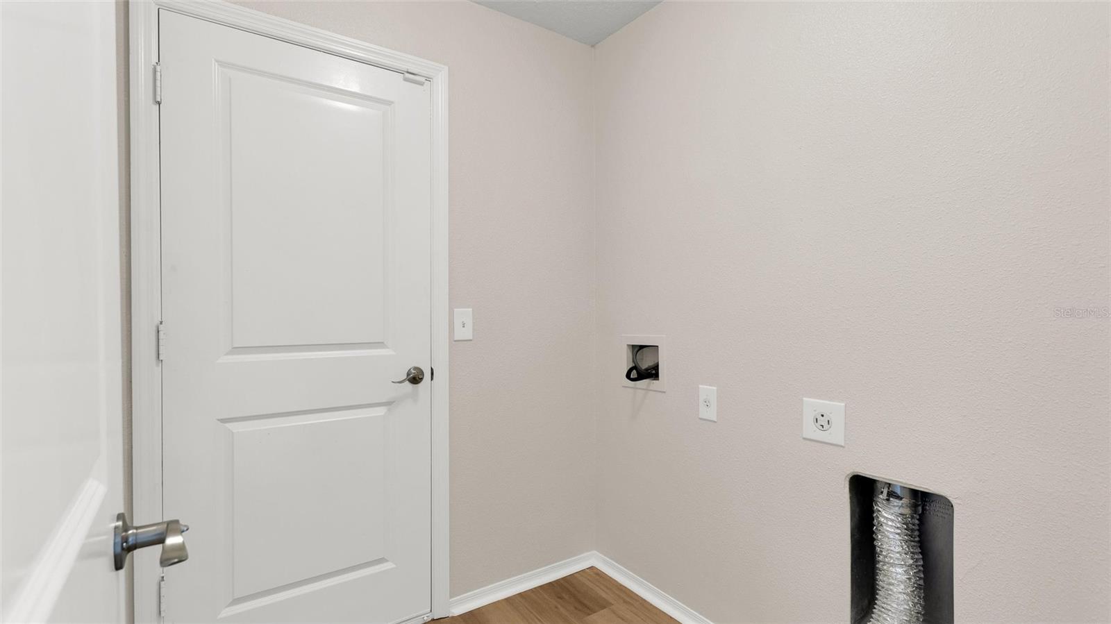 Laundry room.  Door leads out to the garage.