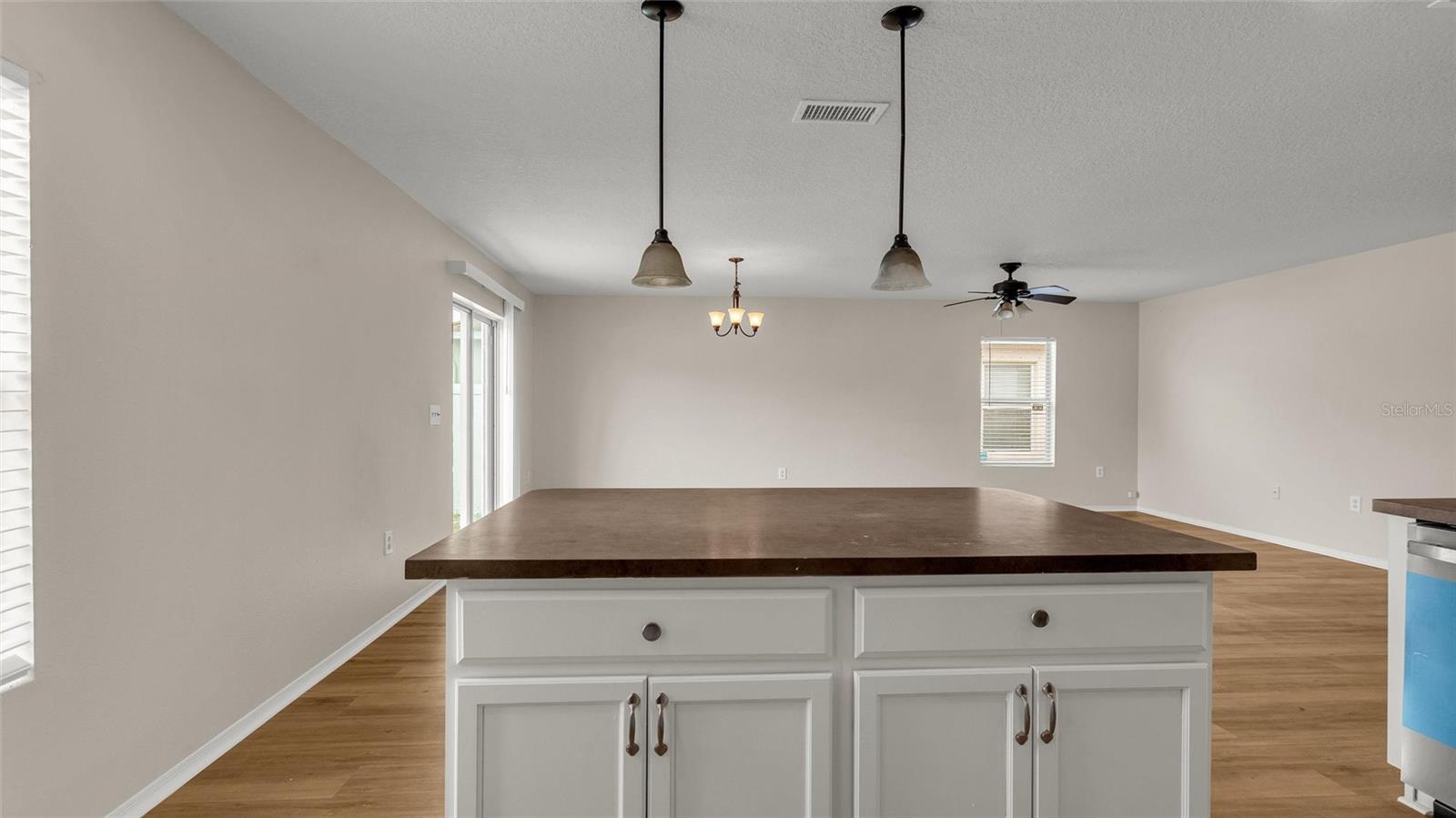 Kitchen has a handy island for meal prep and informal eating.