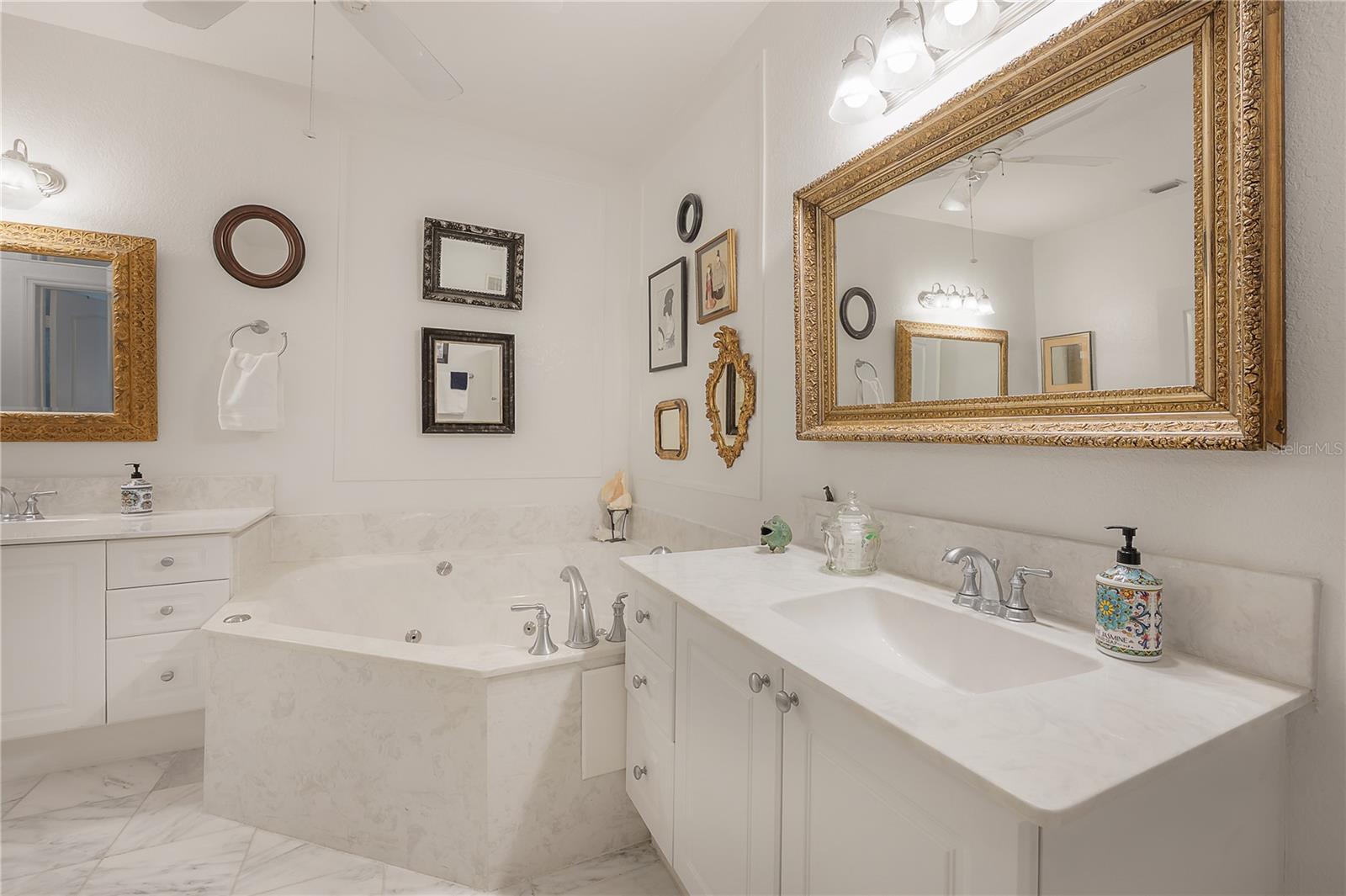 Dual vanities and jetted whirlpool tub