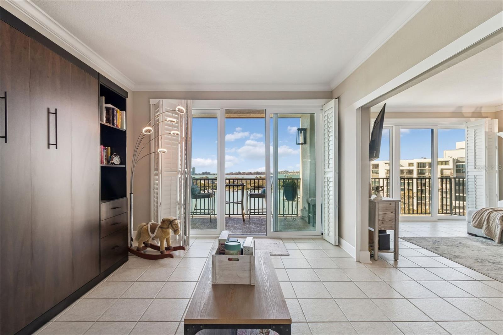 Guest bedroom with Murphy Bed providing flexible space