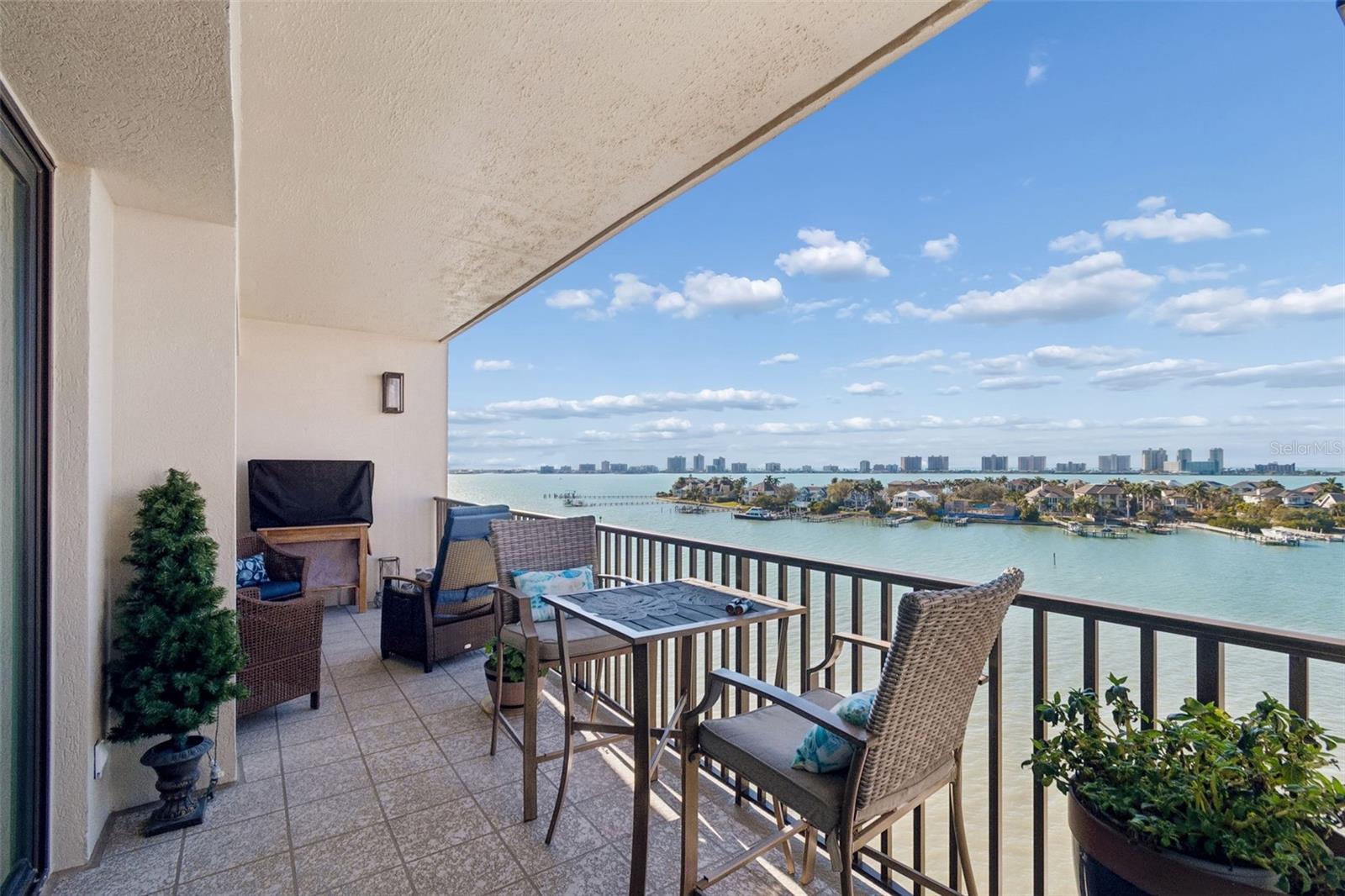 Hurricane Sliding Glass Doors lead to spacious balcony and breath-taking views!