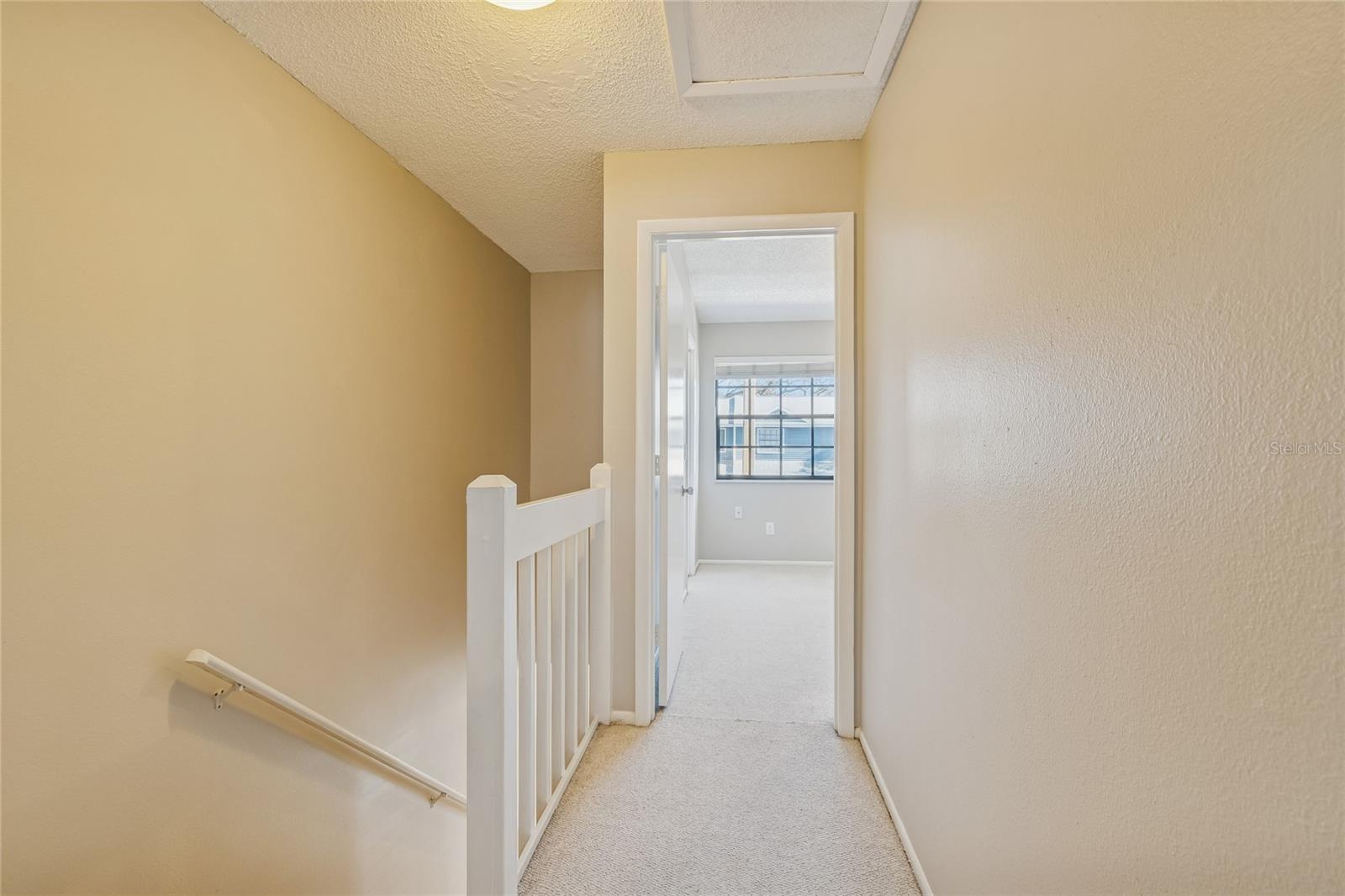 View to 2nd bedroom from landing top of stairs