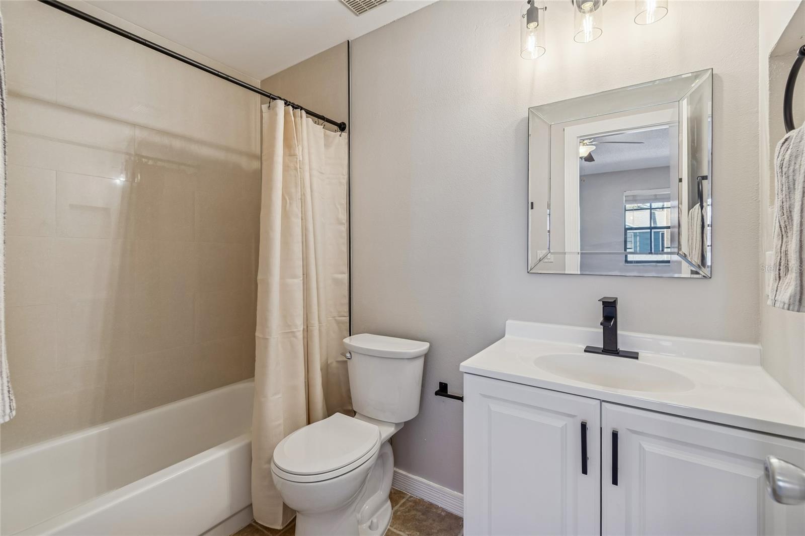 2nd ensuite new fixtures, vanity,toilet and tile