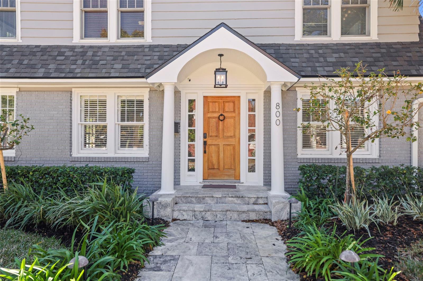 Tree-canopied streets and historic architecture create an unforgettable first impression throughout the neighborhood.