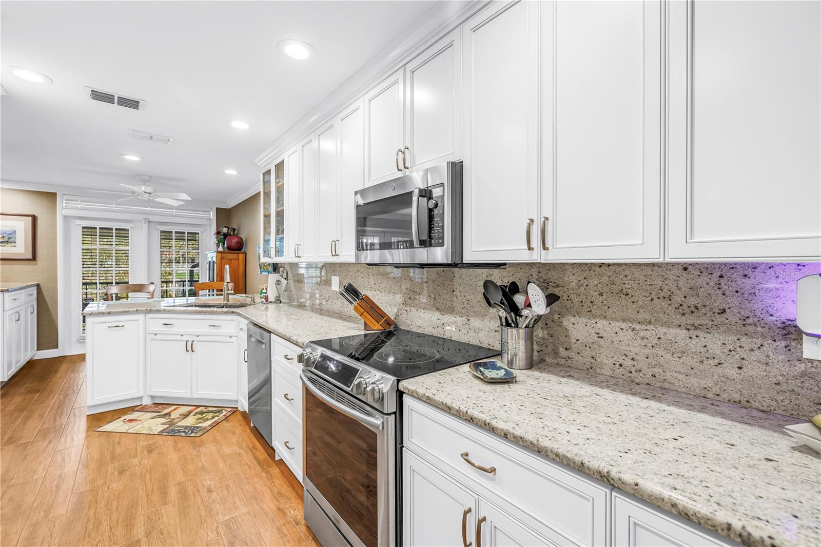 Lots of Granite Workspace, Samsung Range, GE Microwave with True Vented Exhaust