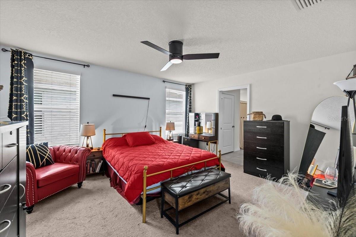 Primary bedroom w/ ensuite