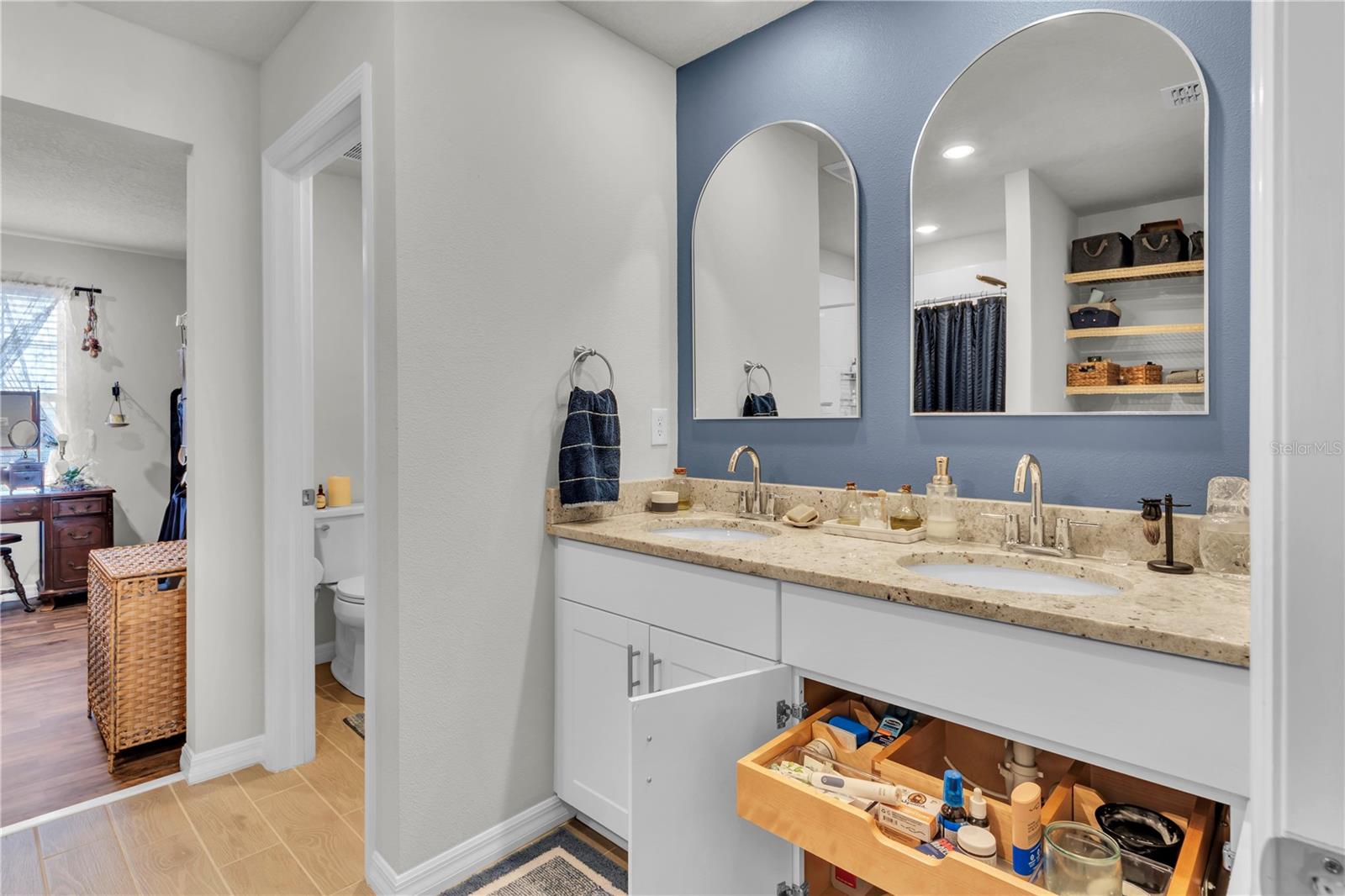 Slide out shelving in the bathroom.  I mean come on.  SERIOUSLY come on!!!  You weren't going to add this but you know you want it.