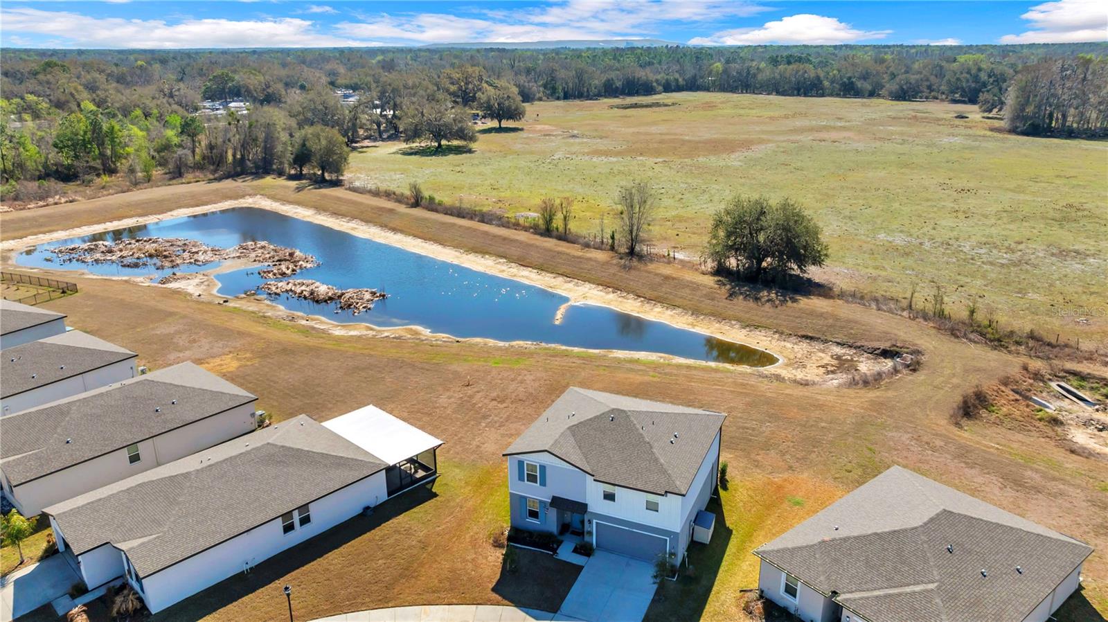 50+ acres plus behind the home with ZERO back yard neighbors.
