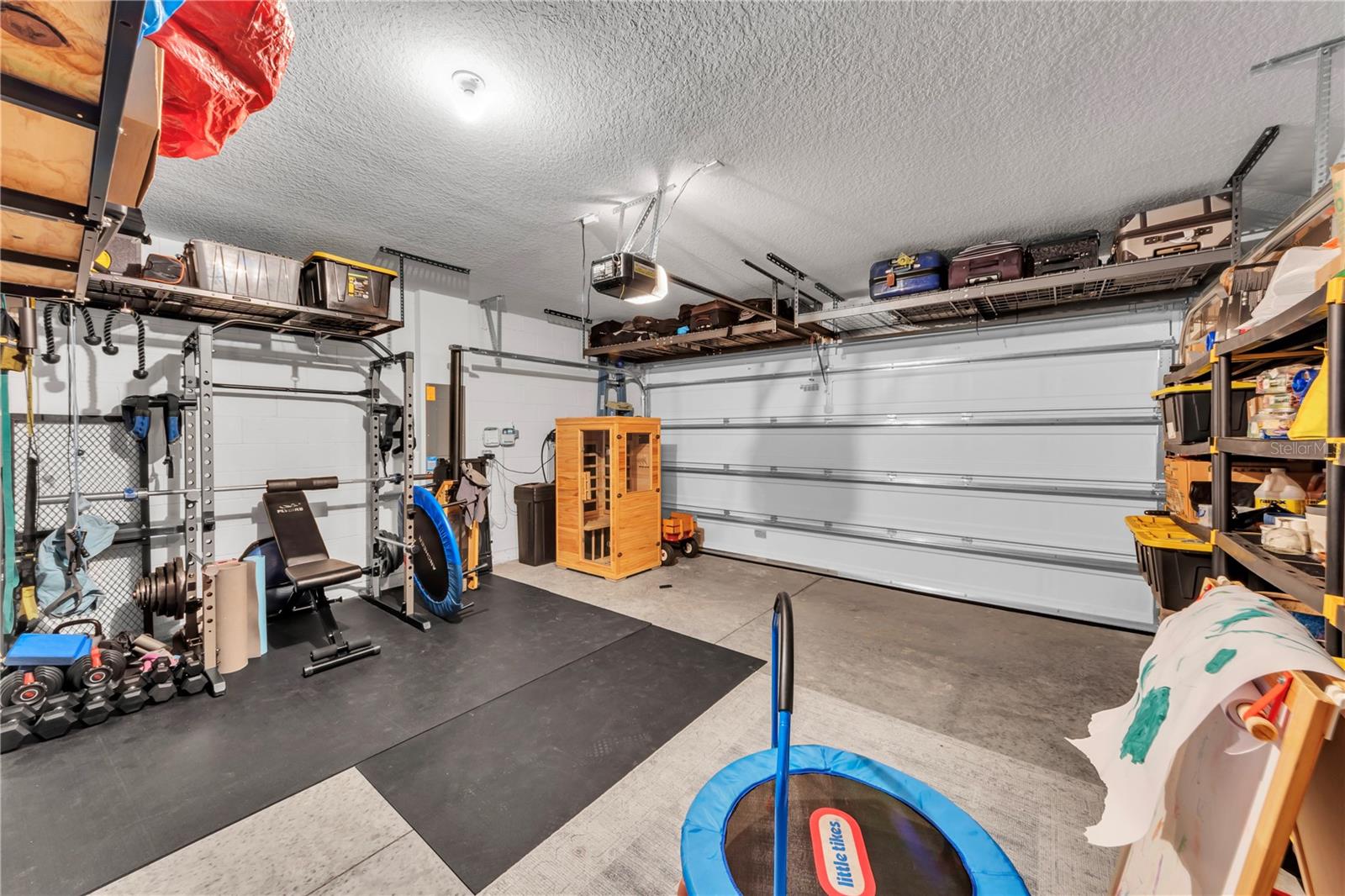 Even the garage has SHELVING Galore.