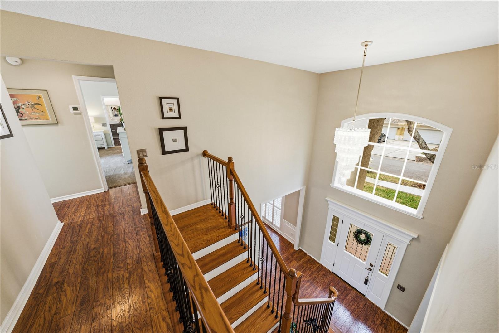 Solid Wood Staircase and Two Story Foyer