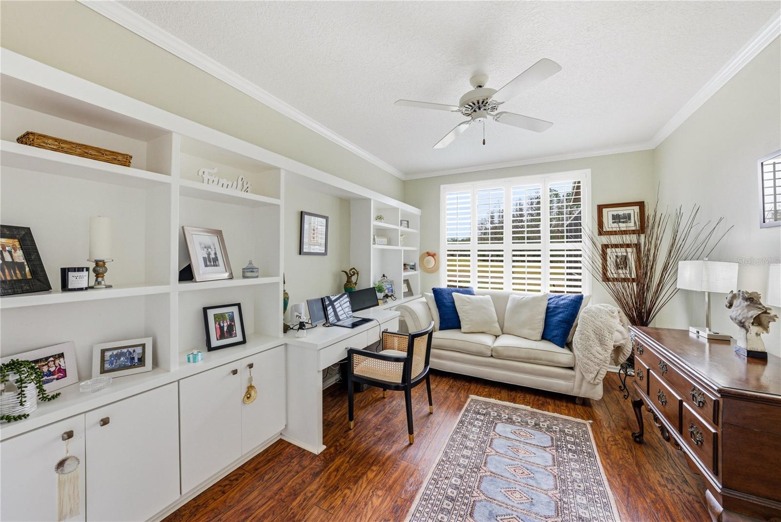 5th Bedroom/Office In Law Suite on First Floor with Laminate Floors and Plantation Shutters