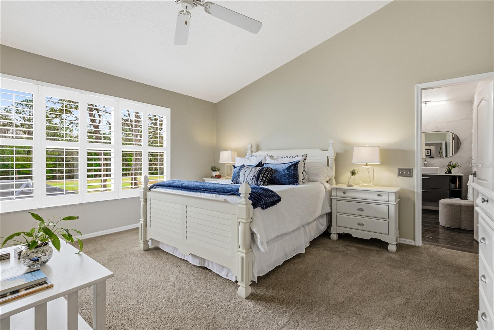 Primary Suite with Large Sitting Area and Views to Golf Course