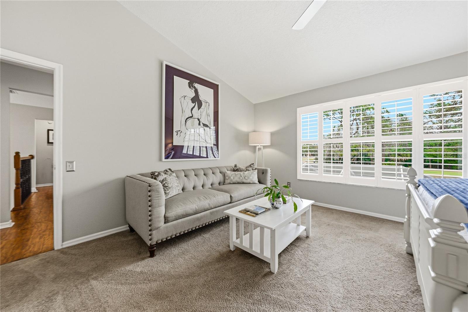 Sitting Area in Primary Suite with Plantation Shutters